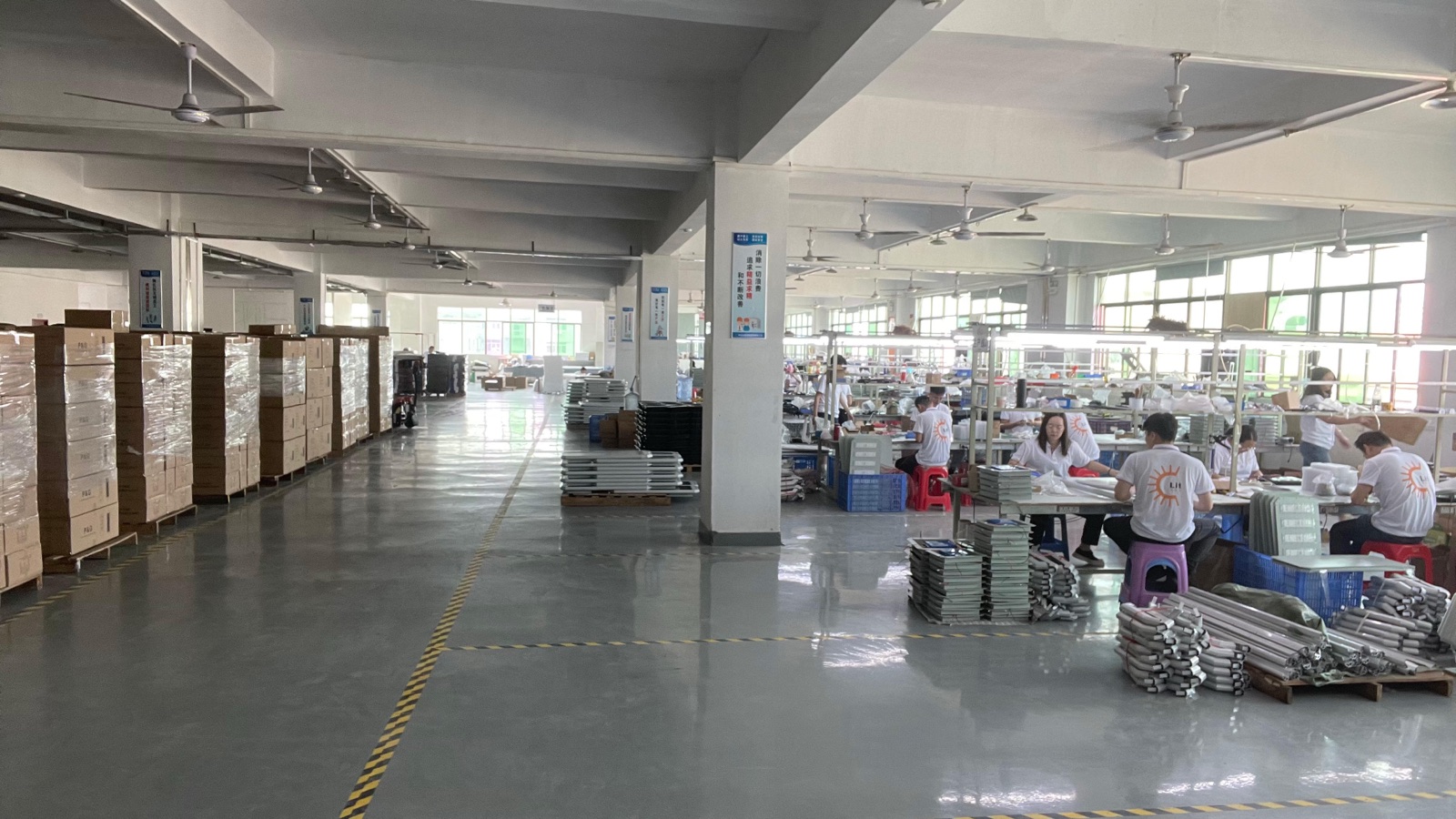 Assembly floor with packed products and workstations