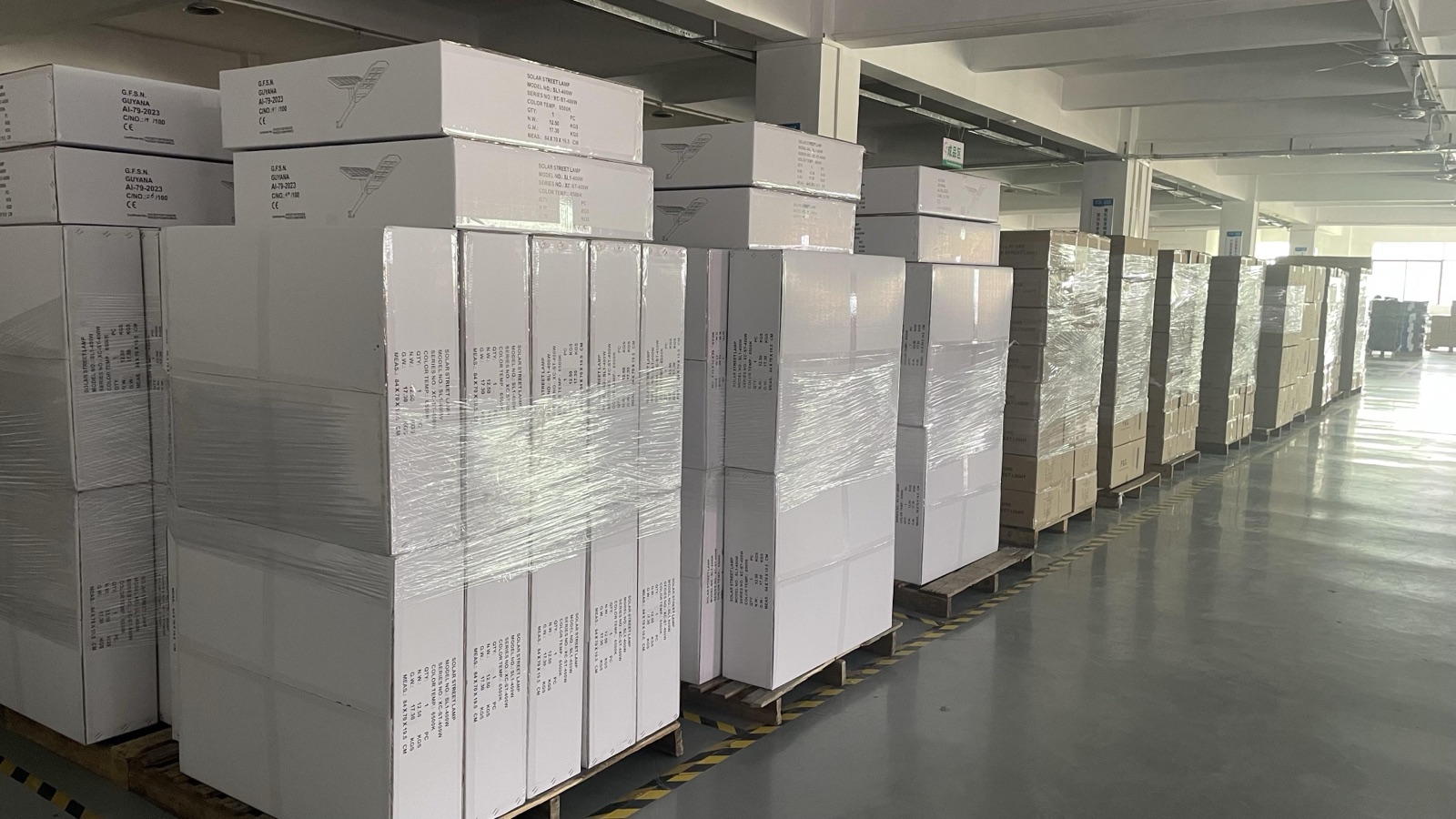 Packed solar street light cartons in a warehouse